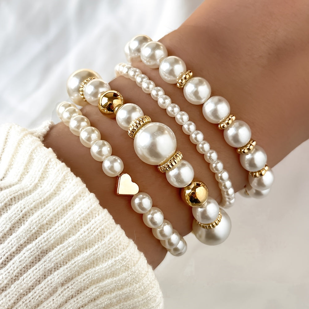Armbandset med pärlor och hjärtan